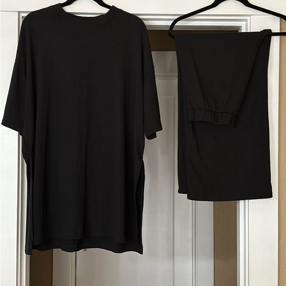 Dressed in Lala black playsuit size large